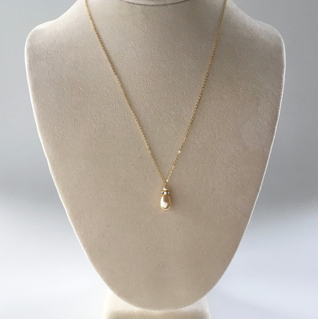 Gold bridal necklace with tear drop pearl