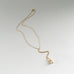 gold pearl and crystal pendant necklace