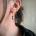 purple cats eye glass drop earrings