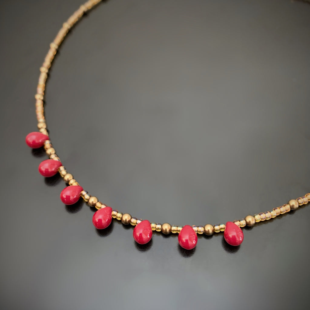 red teardrop choker with bronze tone beads