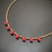 red teardrop choker with bronze tone beads