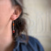 red and orange beaded long and lightweight earrings