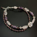 southwest style cross on two strand bracelet beaded with garnet, rose quartz and amethyst