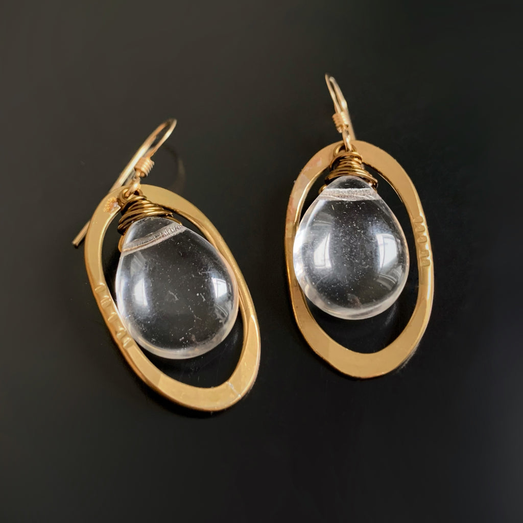 earrings with clear glass teardrop inside brass oval