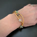 your choice of three gold tube stretch bangle bracelets with ancient looking glass  with the colors of white, green or purple