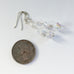 iridescent crystal long drop silver earrings detail