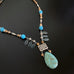 turquoise teardrop necklace with filigree focal and jasper beads