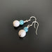 speckled turquoise glass and creamy white howlite drop earrings