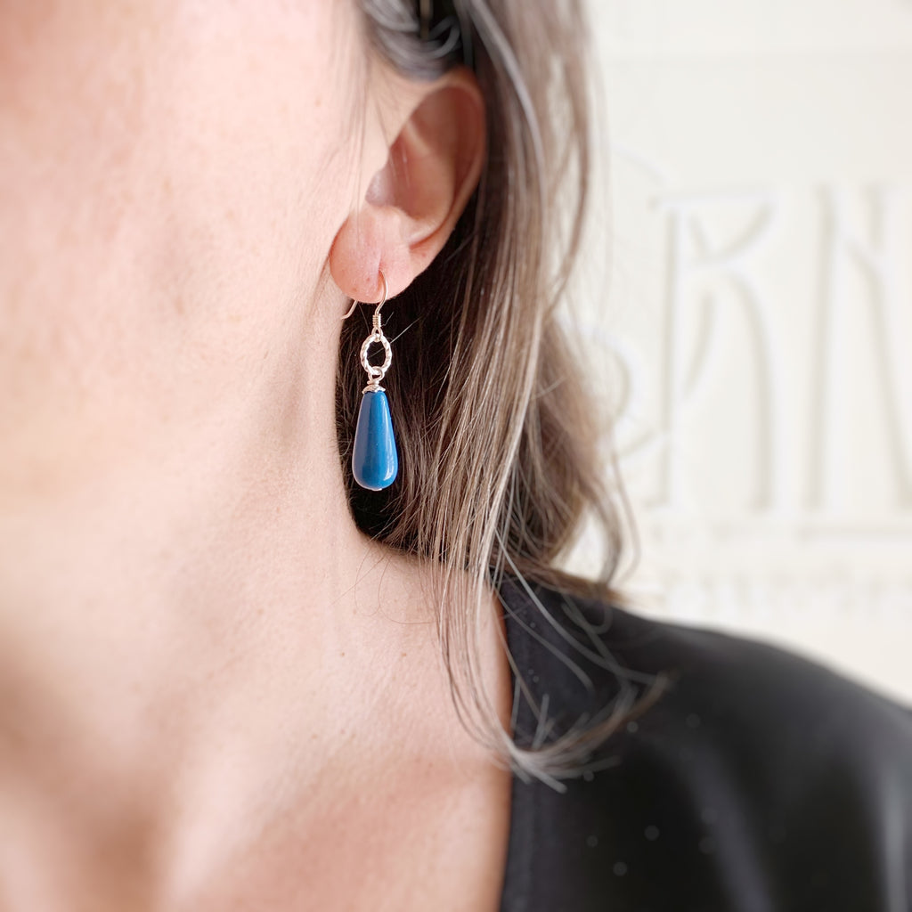 cadet blue glass teardrop earrings with sterling silver ear wires and twisted loop