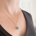 turquoise and crystal teardrop necklace on gold plated chain