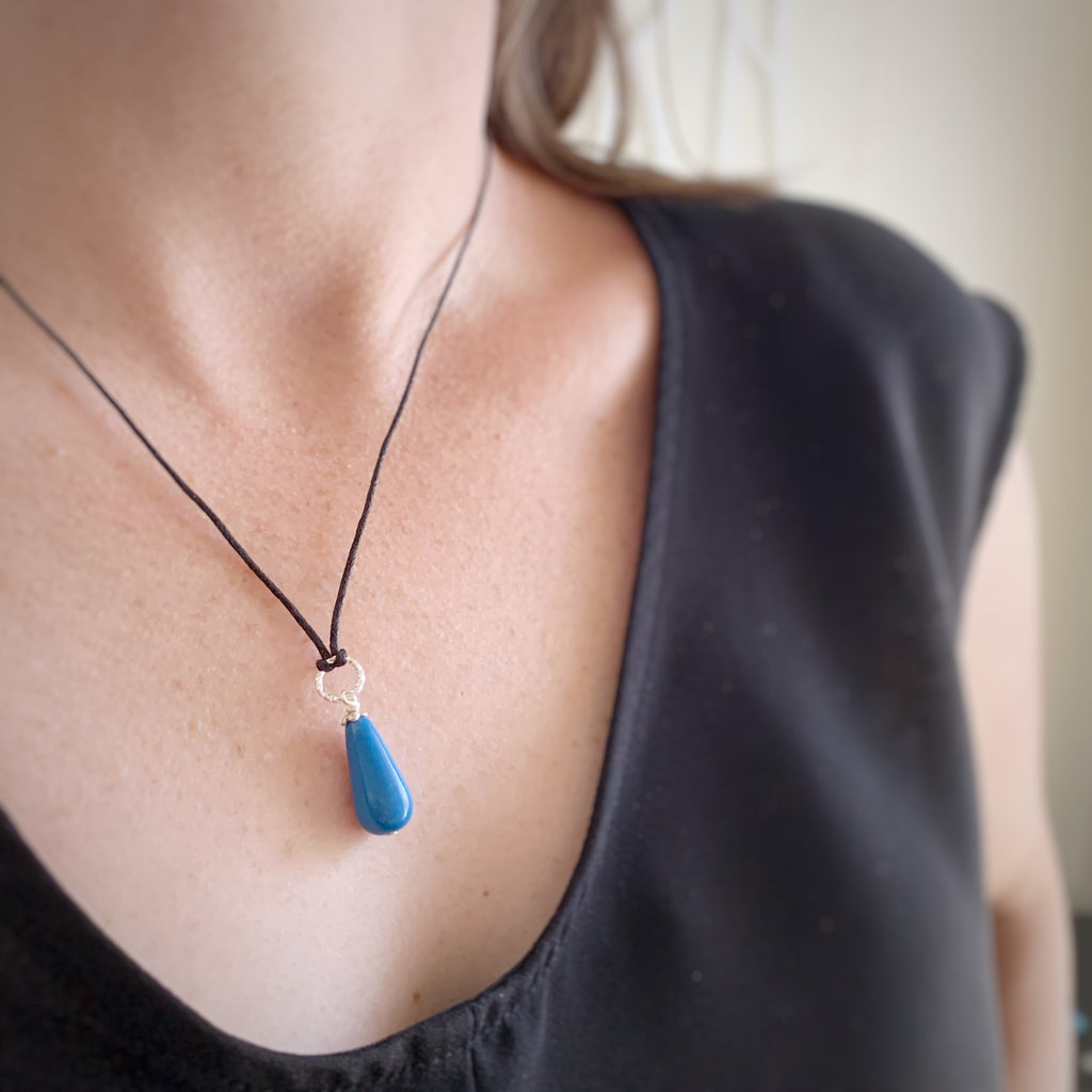 cadet blue glass teardrop necklace with silver twisted loop
