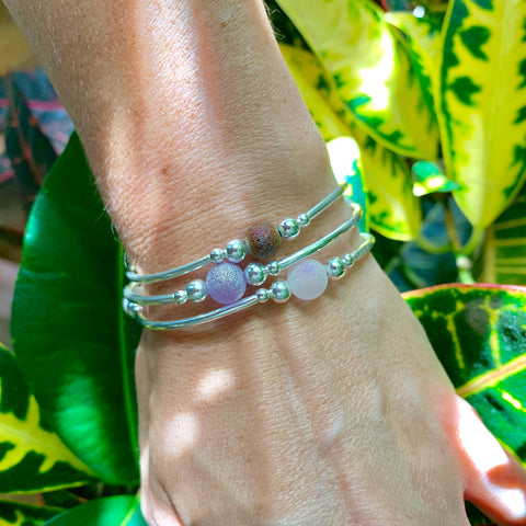Trio of beachy glass bracelets pink and purple