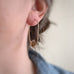 Crystal Point Hoop in gold and dark bronze