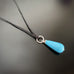 glass teardrop necklace with silver twisted look in sky blue color option