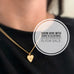 Light Hearted, pendant in 14k gold with white sapphire and cross on reverse NO CHAIN
