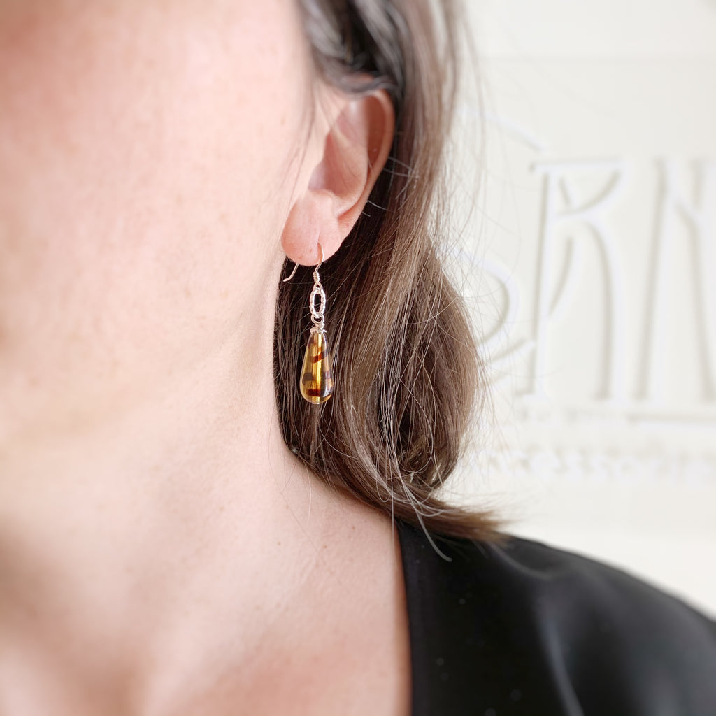 tortoise shell brown glass teardrop earrings with twisted wire circle accent and sterling silver earwires