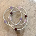 Trio of beachy glass bracelets pink and purple