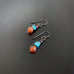 handmade carnelian, turquoise and garnet earrings on hypoallergenic niobium ear wires