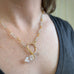 hand made golden brass toggle with clear quartz crystal point