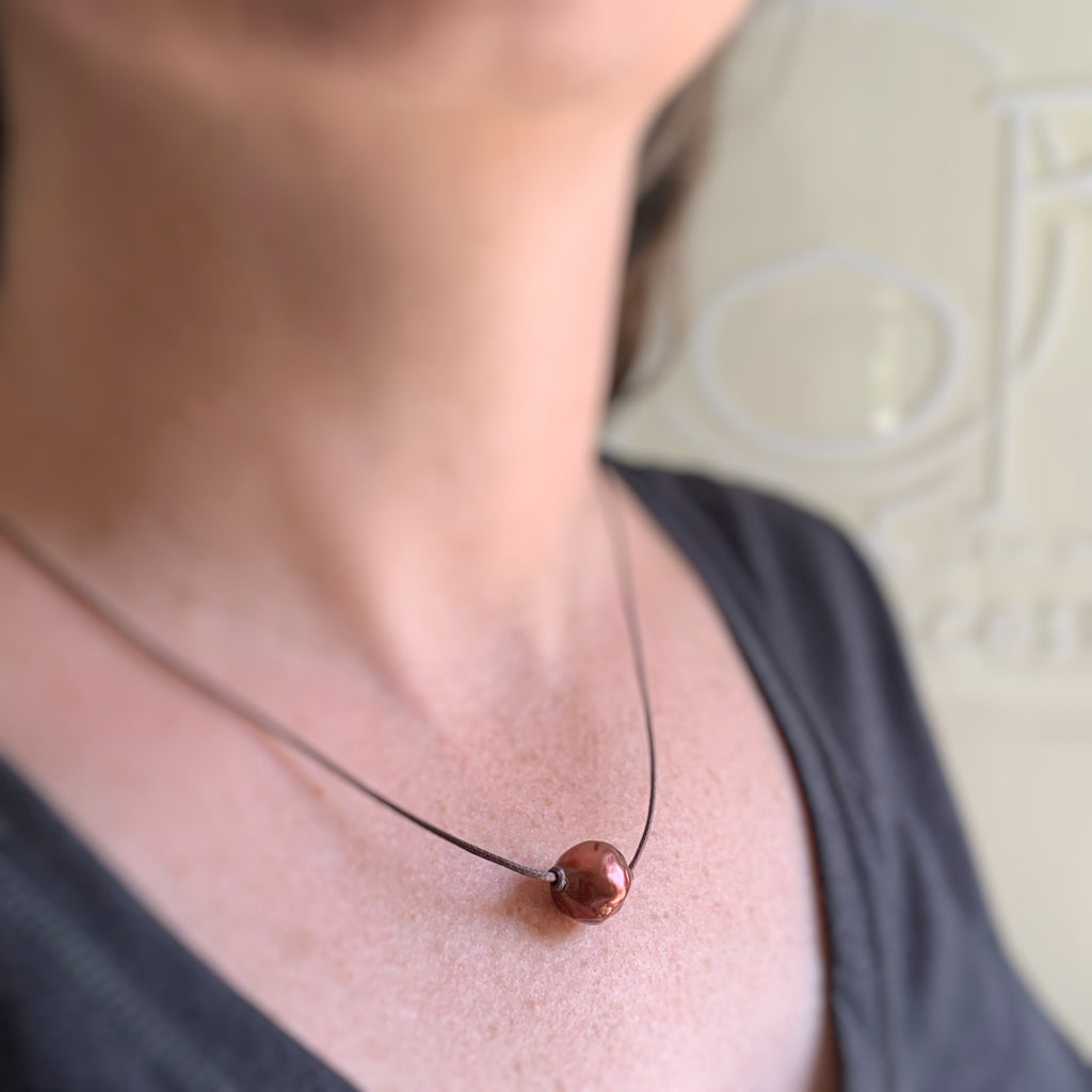 copper brown freshwater pearl necklace on brown cord