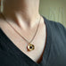 gold cherry blossom flower necklace on black chain