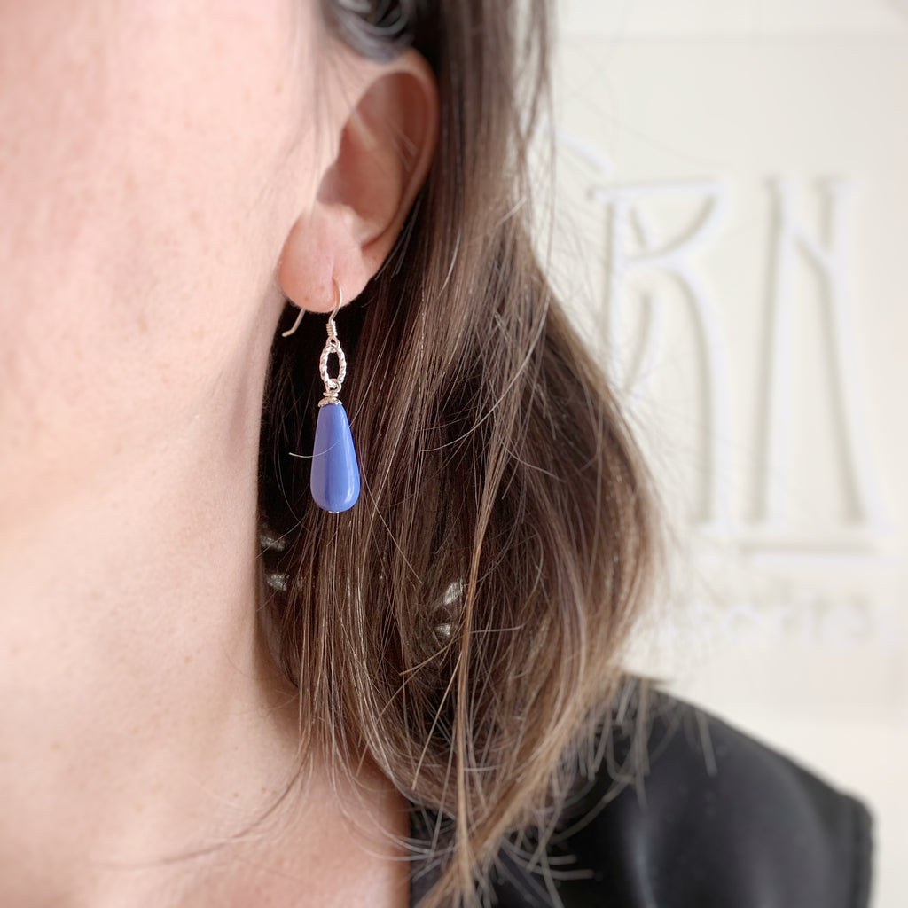 periwinkle blue glass teardrop earrings with sterling silver ear wires and twisted loop