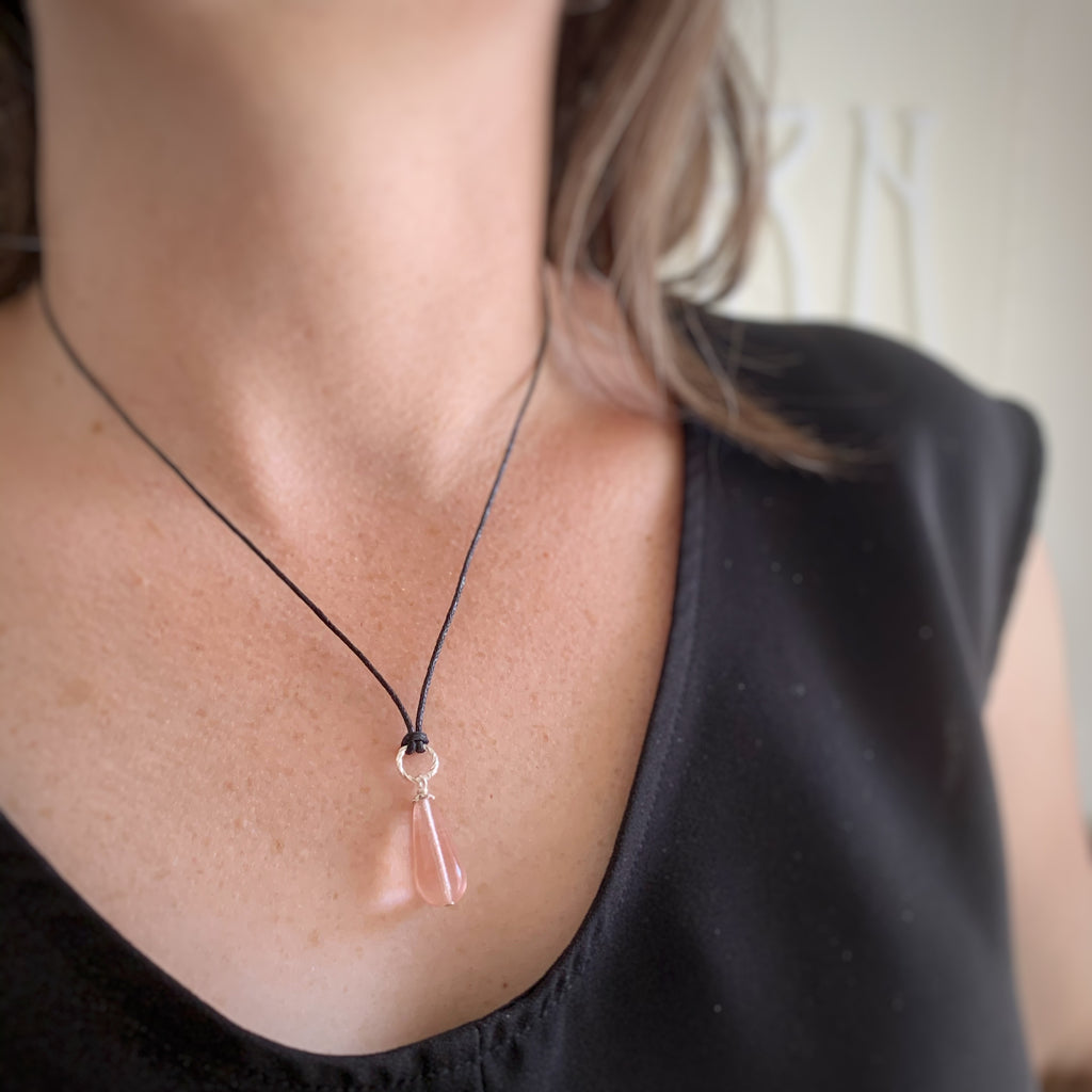 pink glass teardrop necklace with silver twisted loop