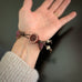 Woven Bracelet with Rose Quartz Turquoise and Striped Button Clasp