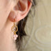 rose quartz cluster drop earrings in gold