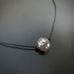black cord necklace with silver grey freshwater pearl focal