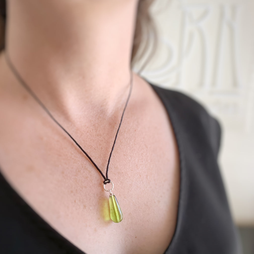peridot green glass teardrop pendant necklace with circle accent