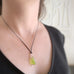 peridot green glass teardrop pendant necklace with circle accent