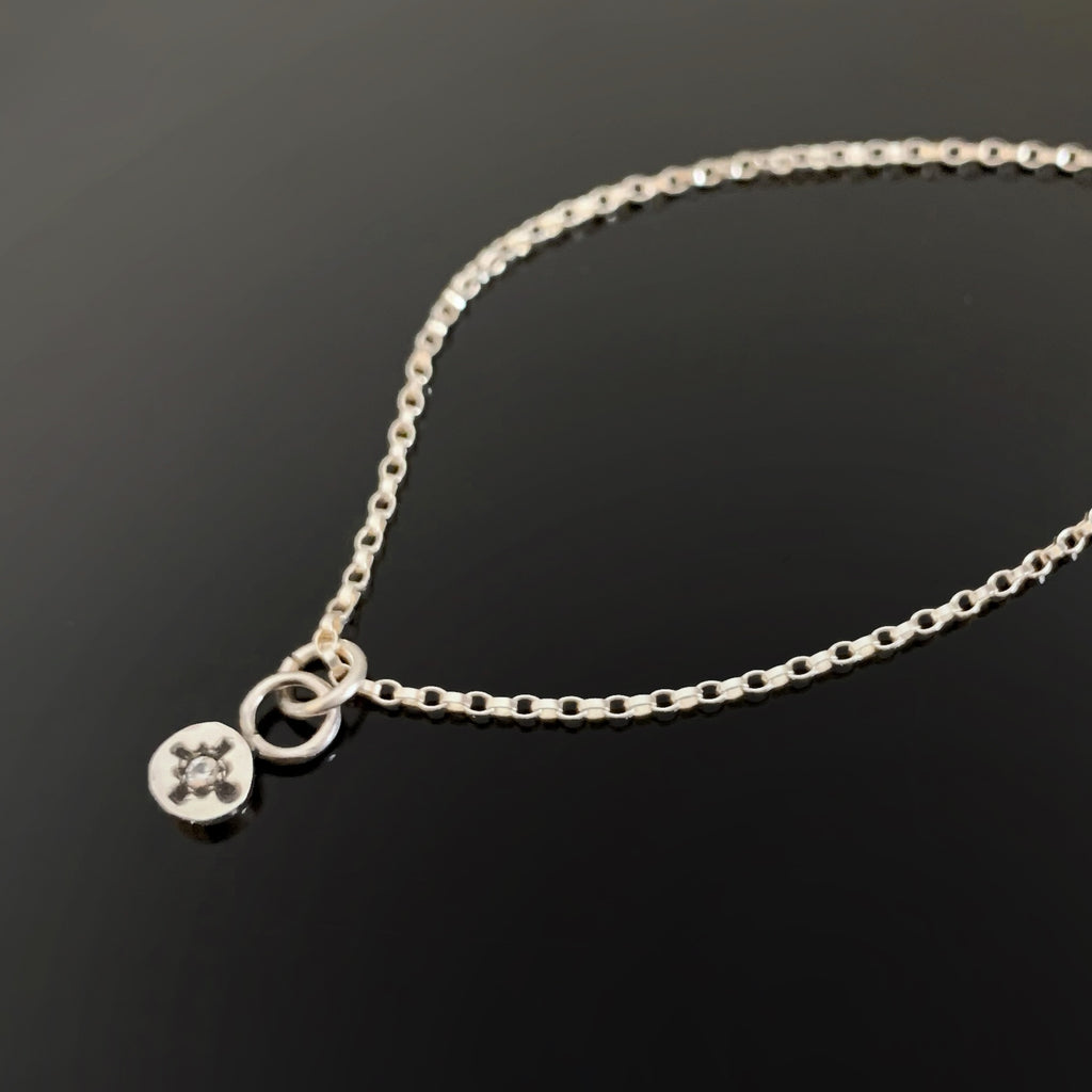 Spark, sterling silver and white sapphire necklace