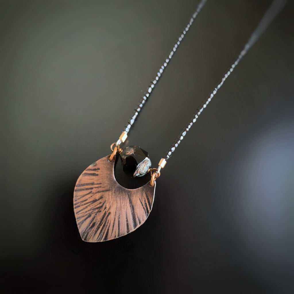 copper fan leaf necklace with black bead accent
