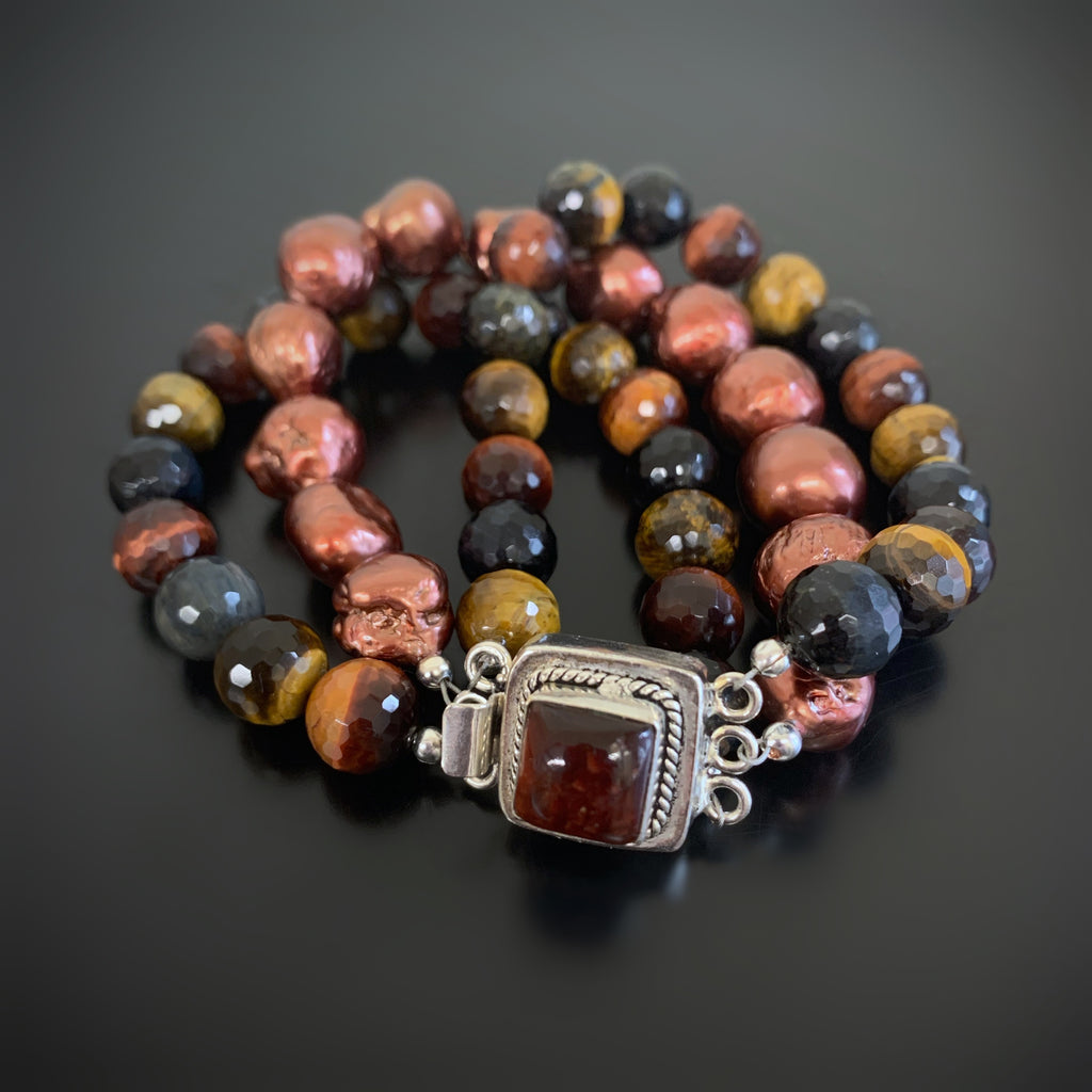 red, blue and brown tigers eye bracelet with ornate clasp and freshwater pearls. 