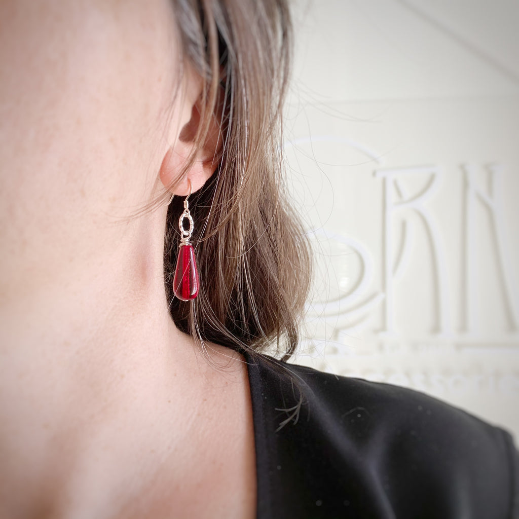 red glass teardrop earrings with sterling silver ear wires and twisted loop