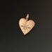 Light Hearted, pendant in 14k gold with white sapphire and cross on reverse NO CHAIN