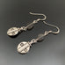 labradorite earrings with a southwest style silver plated bead at the bottom