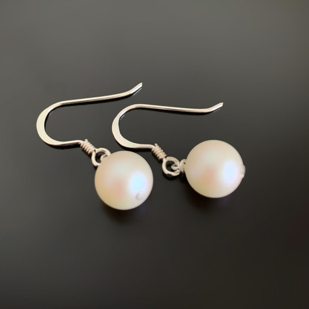 matte finish iridescent crystal pearl earrings with single drop