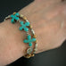 southwest cross double strand bracelet in tan, turquoise and silver