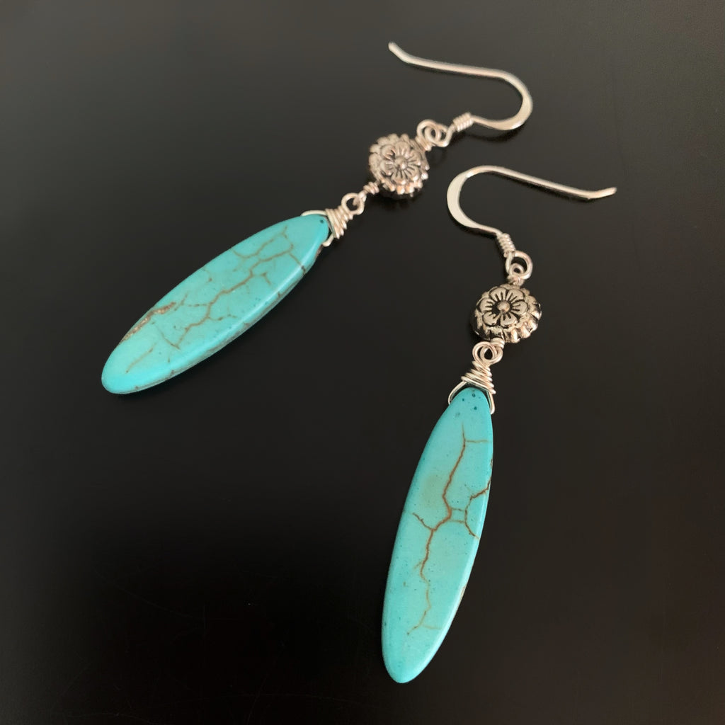 silvery flower and turquoise colored marquise shaped stone earrings