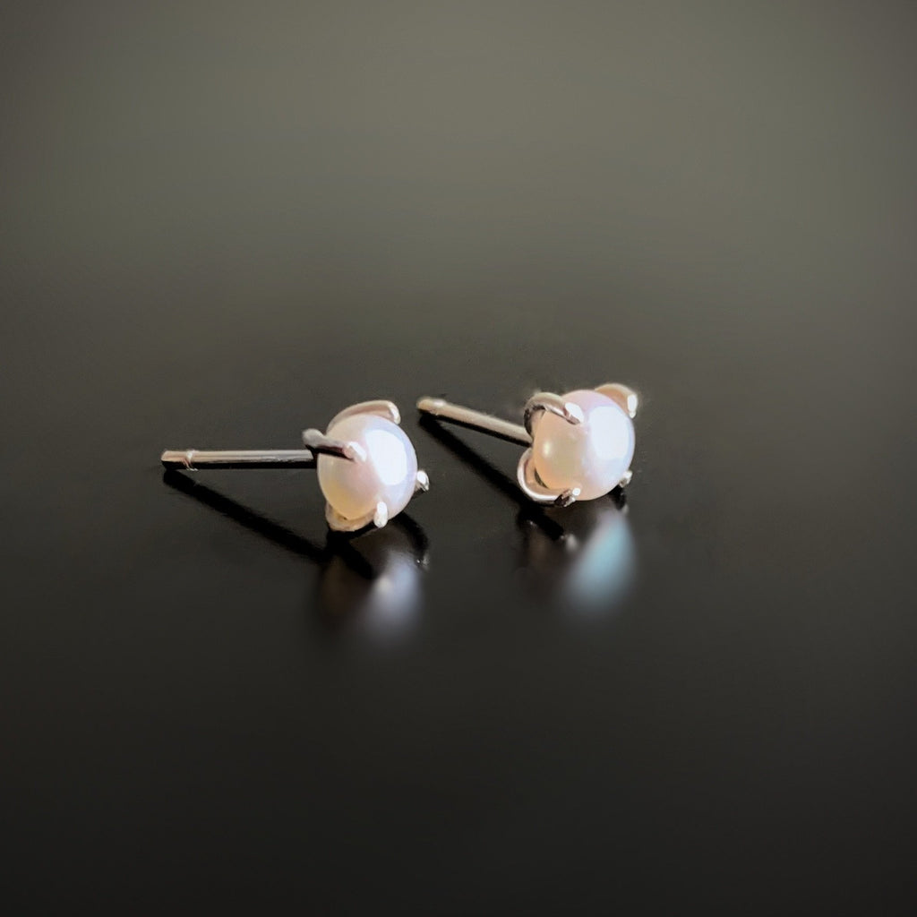 white freshwater pearl post earrings in sterling silver