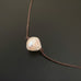 White Freshwater Pearl Necklace on Brown Cord